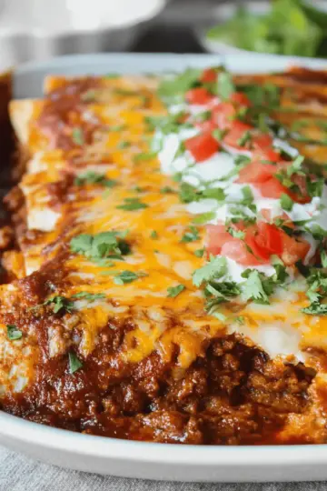 Family Favorite Cheesy Ground Beef Enchiladas